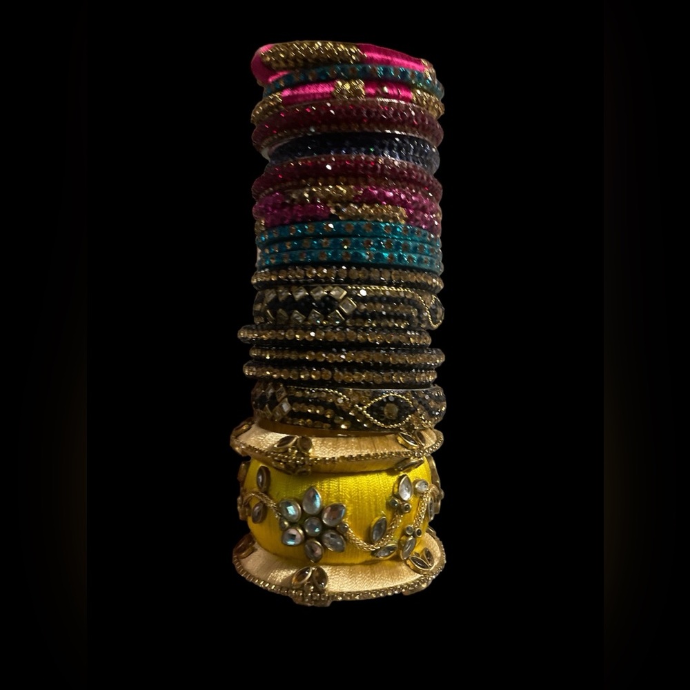 21 beautiful bangles from India, 2.5 interior width.  metal/rhinestones.
